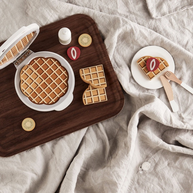 Wafelijzer met servies
